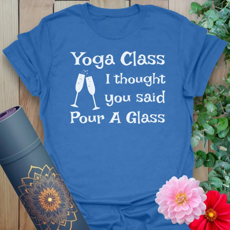 Soft cotton unisex yoga t-shirt featuring funny "Yoga Class? I thought you said Pour A Glass" quote and champagne glasses for playful mindful living.