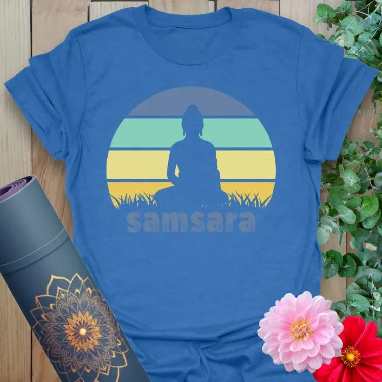 Soft cotton unisex yoga t-shirt featuring meditating figure against colorful sunset with "samsara" text symbolizing mindful spiritual journey.