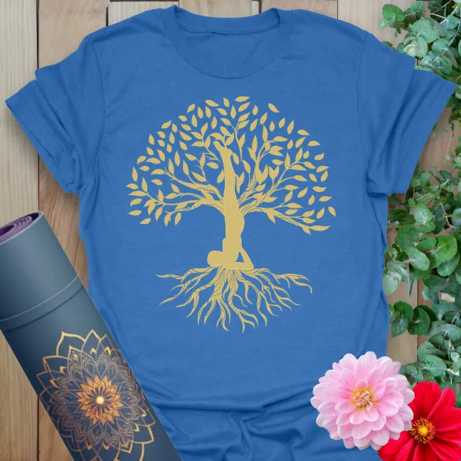 Soft cotton unisex yoga t-shirt featuring yogi in shoulder stand pose blossoming into tree of life for soulful grounded strength.
