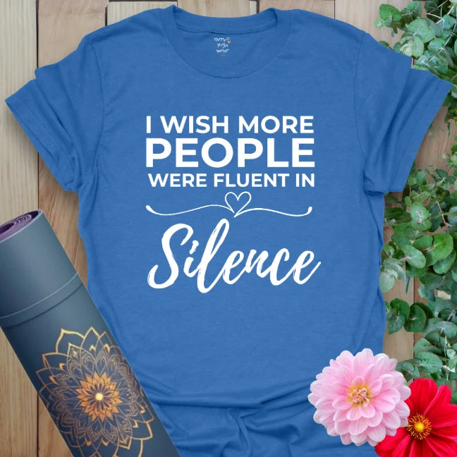 Soft cotton unisex yoga t-shirt featuring mindful "Fluent in Silence" quote design promoting soulful living and conscious presence.
