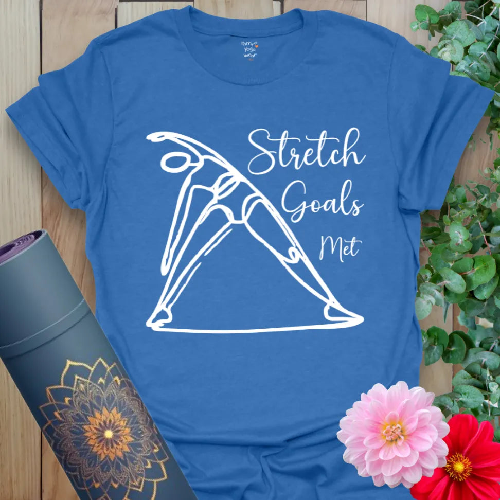 Soft cotton yoga tee featuring yogi in Triangle Pose and “Stretch Goals Met” design, ideal for movement with humor.