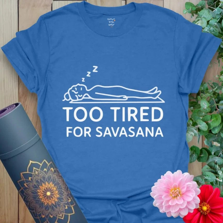 Heather Royal Too Tired T-Shirt with resting yoga silhouette and “Too Tired for Savasana” text. Funny yoga gift tee with nap humor.
