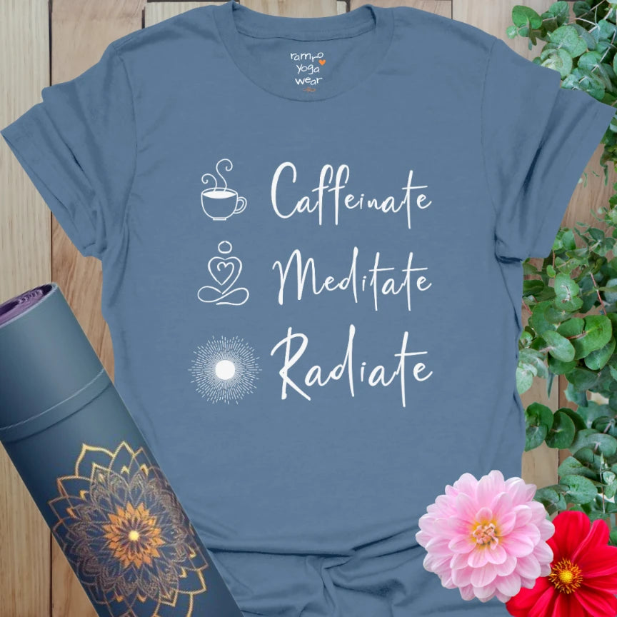 Indigo Blue Caffeinate T-Shirt with bright white graphics. Perfect for pairing your flow state with your favorite brew.