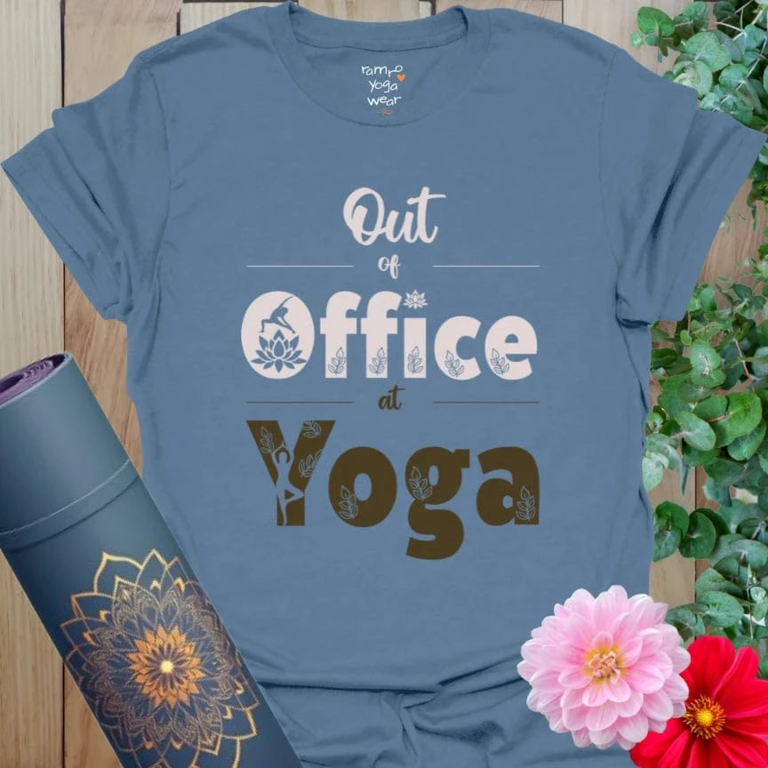 Indigo Blue Out Of Office T-Shirt with stylized “Out of Office at Yoga” message and yoga symbols. Soft tone for balance, humor, and movement.