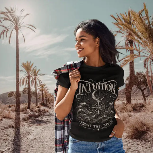 Ramro Yoga Wear Intuition tee in Black — compass and ocean waves vintage design, desert palm trees lifestyle shot