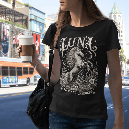 Ramro Yoga Wear Luna tee in Black — lifestyle shot, city street, wild horse botanical vintage engraving