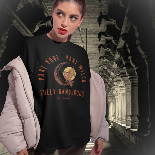Woman wearing Magic black funny yoga shirt in gothic archway — Funny Yoga Shirts collection by Ramro Yoga Wear