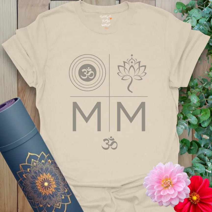 Natural tee with grounding grey symbols — Om ripples, lotus, and mirrored M’s. Balanced energy for spiritual wear.