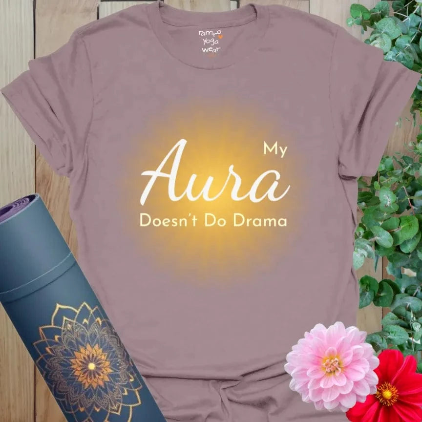 Muted purple tee with warm glow and “My Aura Doesn’t Do Drama” in white and gold. Peaceful statement shirt with spiritual sass.