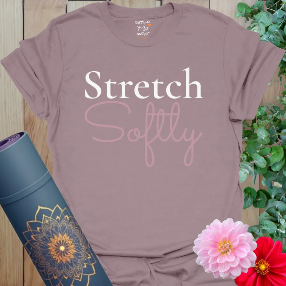 Paragon purple tee with “Stretch Softly” slogan in white and soft pink. A gentle yoga shirt for slow flow and soulful movement.