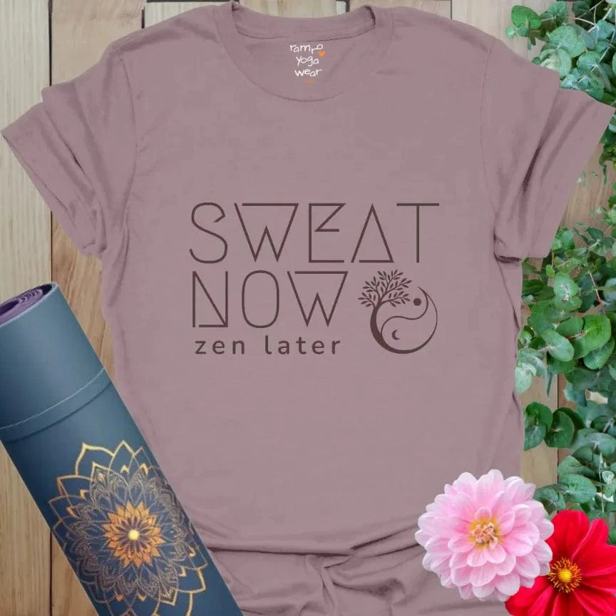 Paragon Sweat Now T-Shirt in earthy purple with motivating mantra “Sweat Now, Zen Later.” Everyday yoga wear with stylish mandala detail.