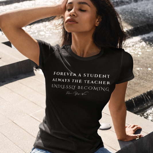 Woman wearing Path Black yoga teacher gift tee by a fountain — Yoga Teacher Gifts collection by Ramro Yoga Wear
