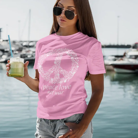 Woman wearing Peace Azalea T-Shirt at the marina holding a drink, sunglasses — The Vault collection by Ramro Yoga Wear