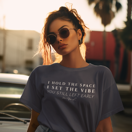 Woman wearing Playlist Heather Midnight Navy yoga teacher gift tee on a city street at golden hour — Yoga Teacher Gifts collection by Ramro Yoga Wear
