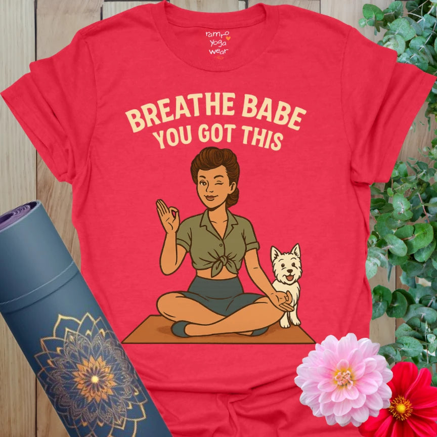 Bold red yoga t-shirt with pinup-style yogi and dog graphic, ideal for empowered breathwork and calm confidence.