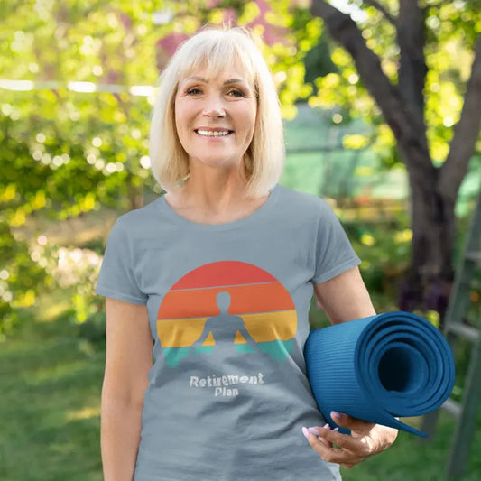 Woman wearing the Retirement T-Shirt in Stone Blue outdoors — The Vault collection by Ramro Yoga Wear