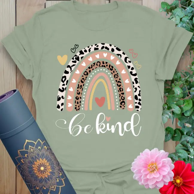 Sage green t-shirt with rainbow of hearts and positive "be kind" message