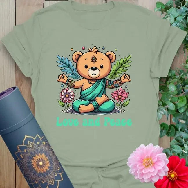 Sage green yoga t-shirt with whimsical bear and peace-themed design