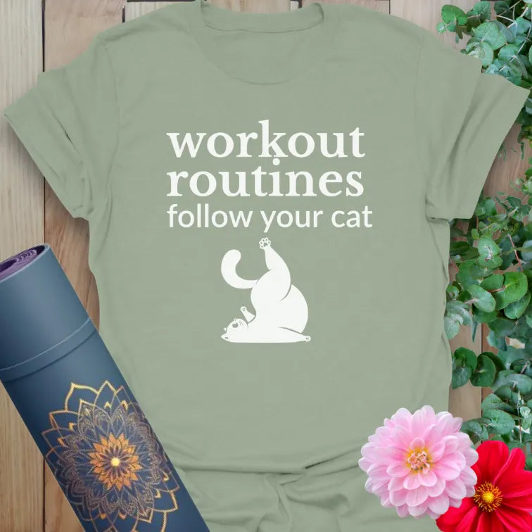 Sage green cat yoga shirt with “follow your cat” quote and stretch graphic