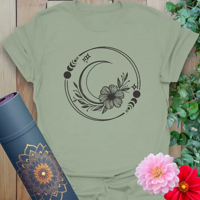 Sage green yoga tee with moon phase, flower, and sacred feminine artwork