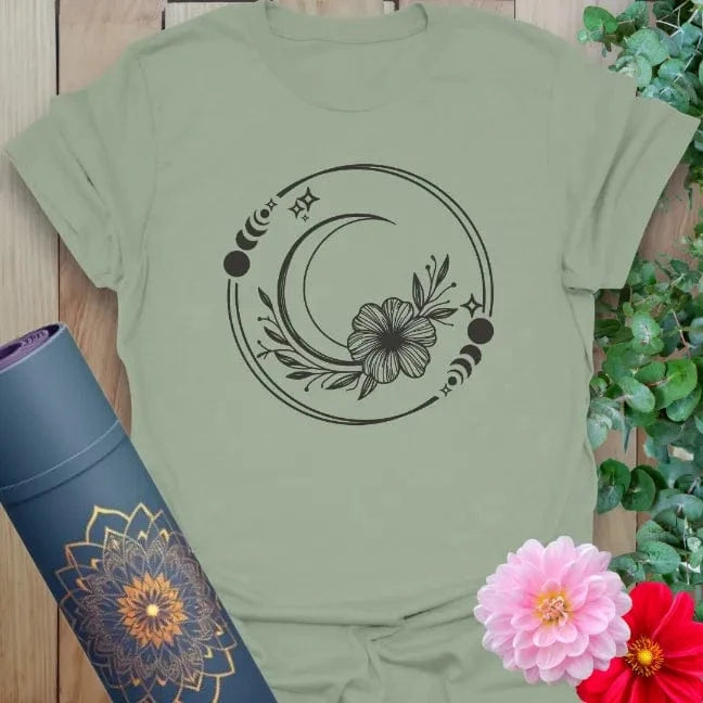 Sage green yoga tee with moon phase, flower, and sacred feminine artwork