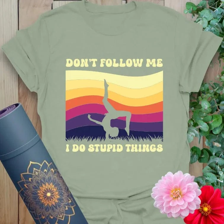 Sage green yoga t-shirt with retro sunset background and funny "Don't Follow Me" quote
