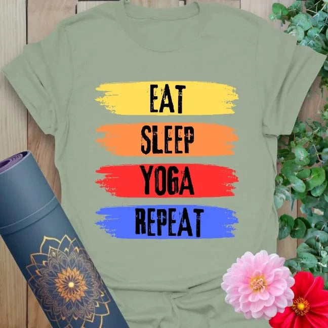 Sage green yoga tee with "Eat Sleep Yoga Repeat" colorful brushstroke art