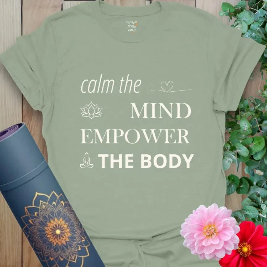 Sage Empower T-Shirt with calming white print: “Calm the Mind, Empower the Body.” Soft cotton yoga clothing for mindful movement.