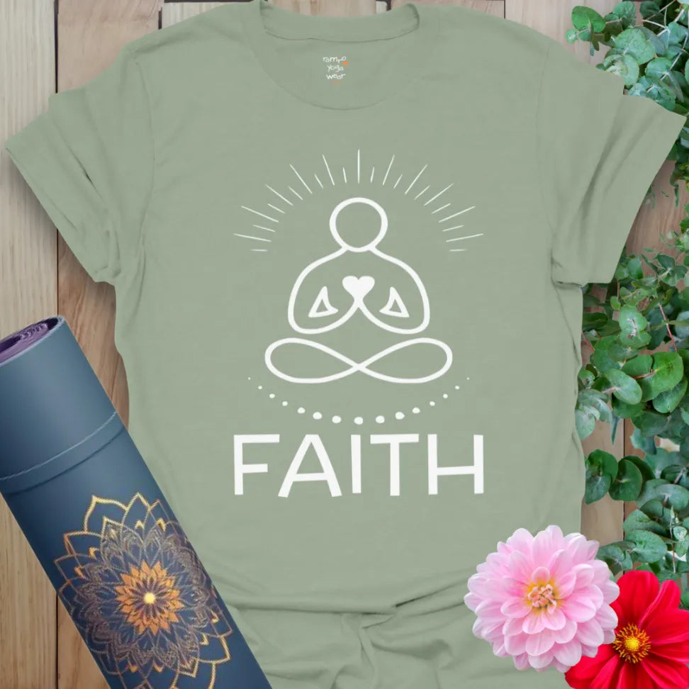 Calm sage green yoga t-shirt featuring heart-centered meditation pose and uplifting "Faith" reminder for daily mindfulness.