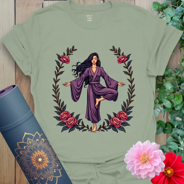 Calm sage green yoga t-shirt featuring balanced yogi within floral wreath for earth-connected mindfulness and soulful flow.