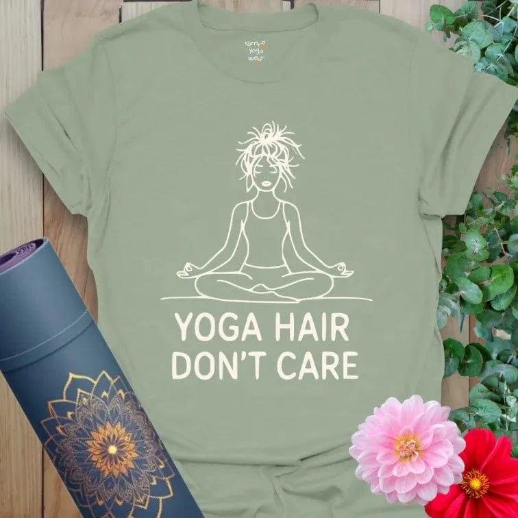 Sage Hair T-Shirt with minimalist white outline of yogi in meditation pose, messy hair, and fun slogan “Yoga Hair Don’t Care.” Soft cotton tee.