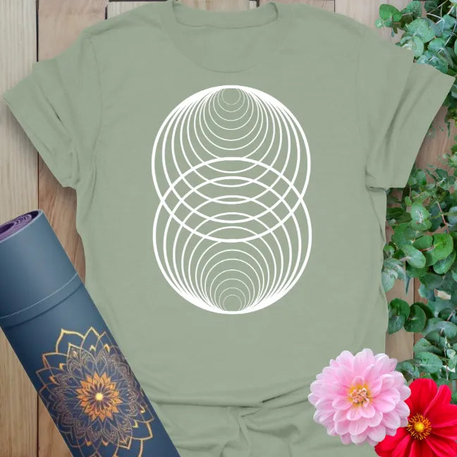 Calm sage green yoga t-shirt featuring sacred balance circle design inspiring grounded, conscious living.