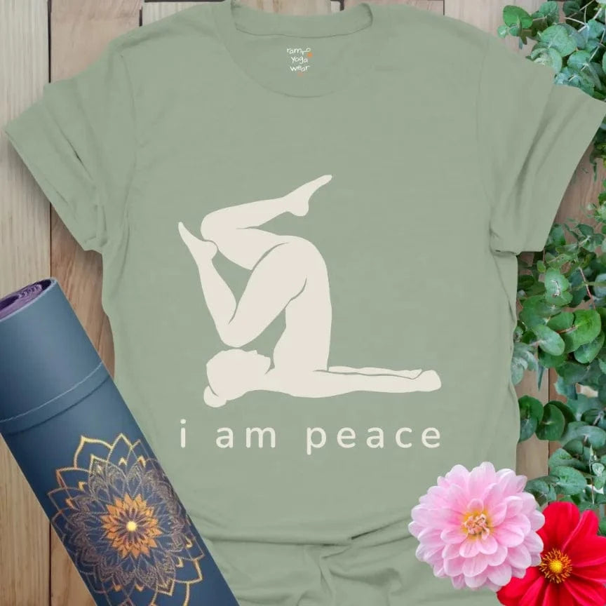Sage green tee with minimalist yoga figure and the words "i am peace."