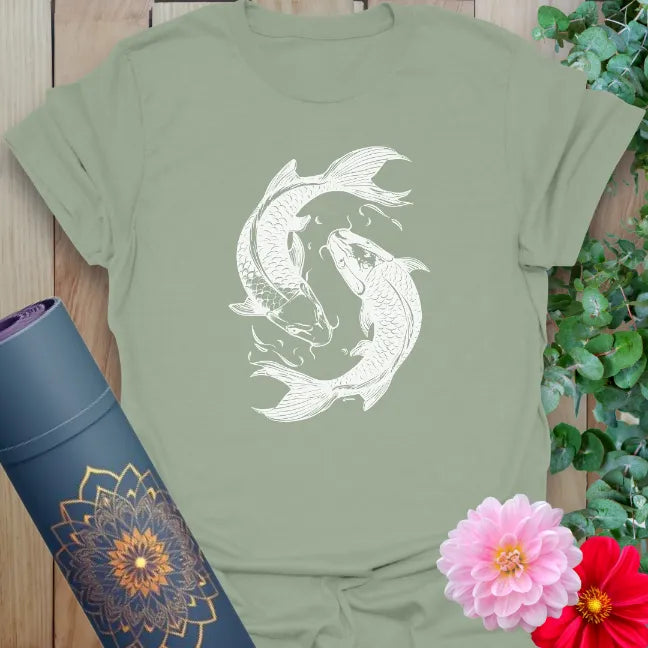 Calm sage green yoga t-shirt with flowing koi fish design representing soulful balance and spiritual harmony.