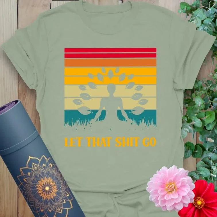 Calm sage green yoga t-shirt with bold "Let That Sht Go" quote and retro yoga design perfect for grounded, soulful living.