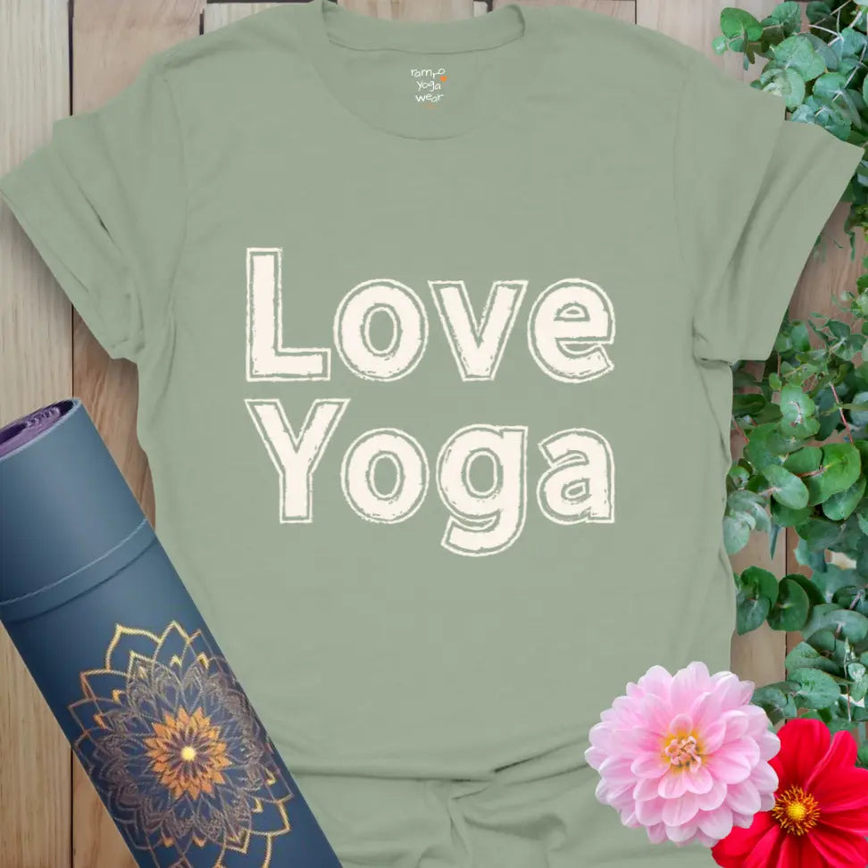 Sage Love Yoga T-Shirt with bold white “Love Yoga” print, versatile for studio or streetwear.
