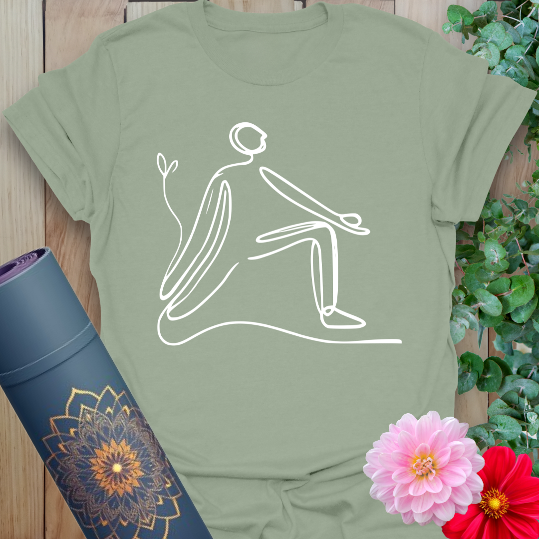 Calm sage green yoga t-shirt featuring simple, flowing lunge pose line art symbolizing conscious growth and balance.