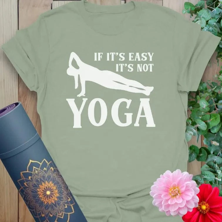 Calm sage green yoga t-shirt featuring funny yoga affirmation inspiring strength, resilience, and heart-centered living.