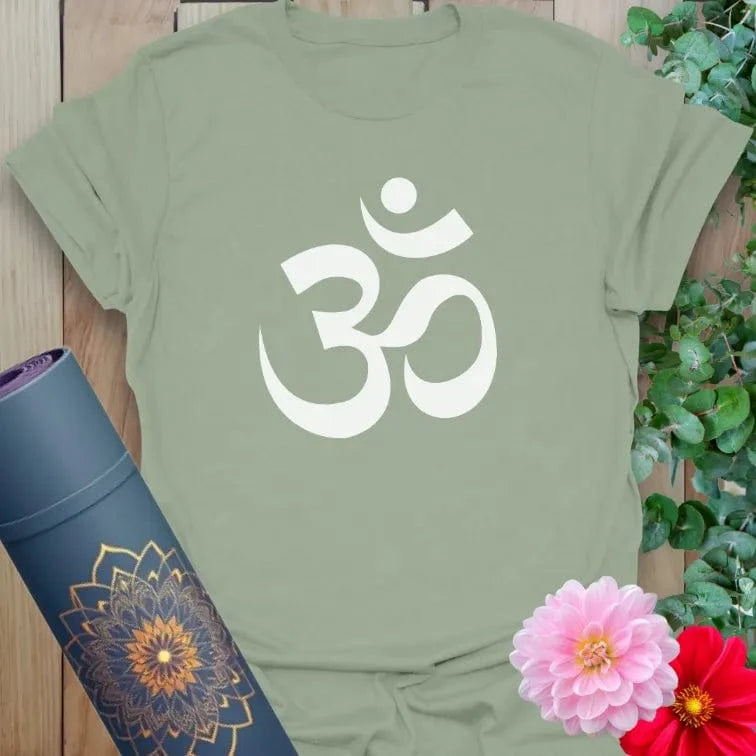 Calm sage green yoga t-shirt featuring sacred Om symbol inspiring grounded soulful living and heart-centered mindfulness.