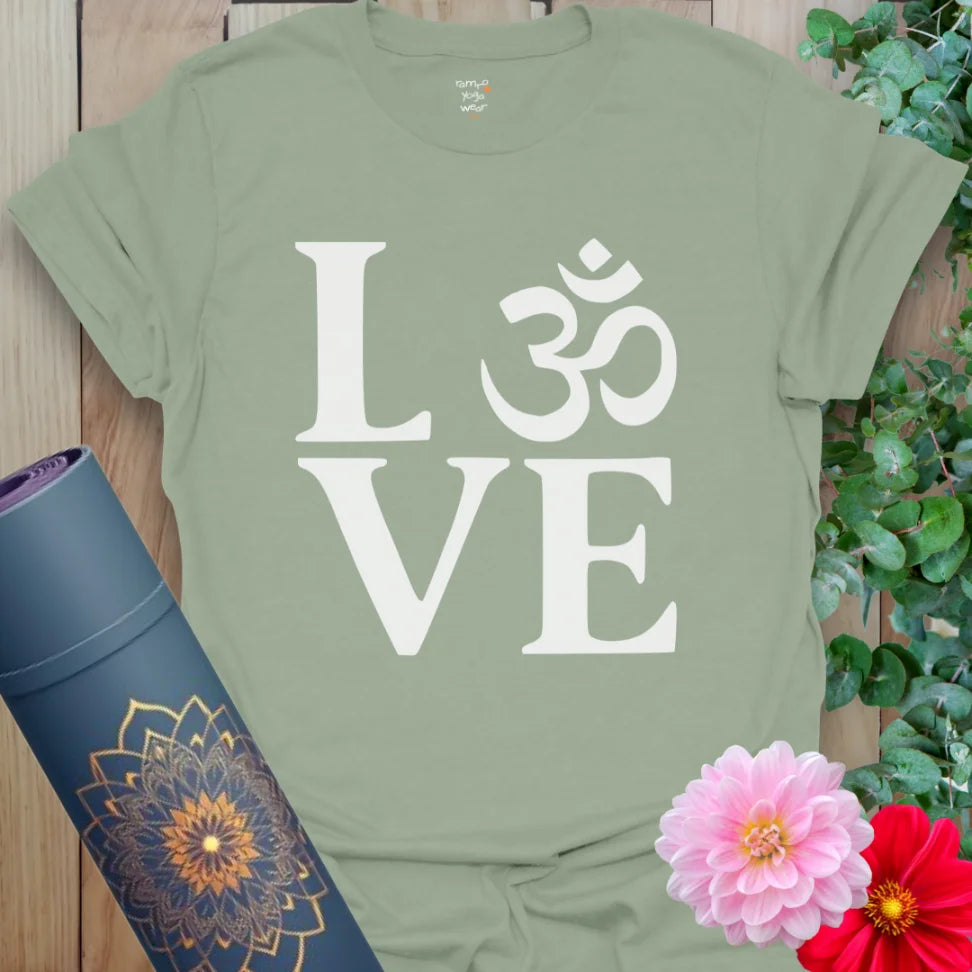 Calm sage green yoga t-shirt featuring creative Om and LOVE design symbolizing mindfulness, inner peace, and spiritual love.