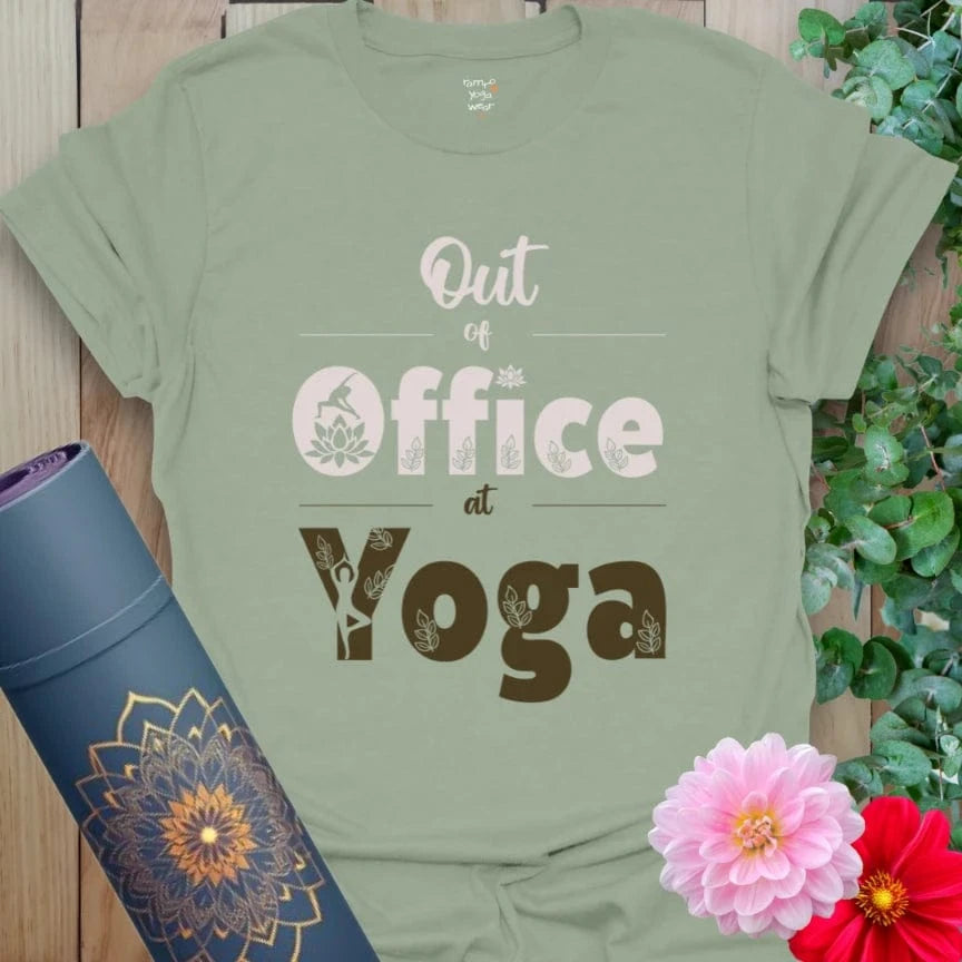 Sage Out Of Office T-Shirt with calming green hues and yoga shapes inside letters. Perfect for nature walks, breathwork breaks, and weekend flow.