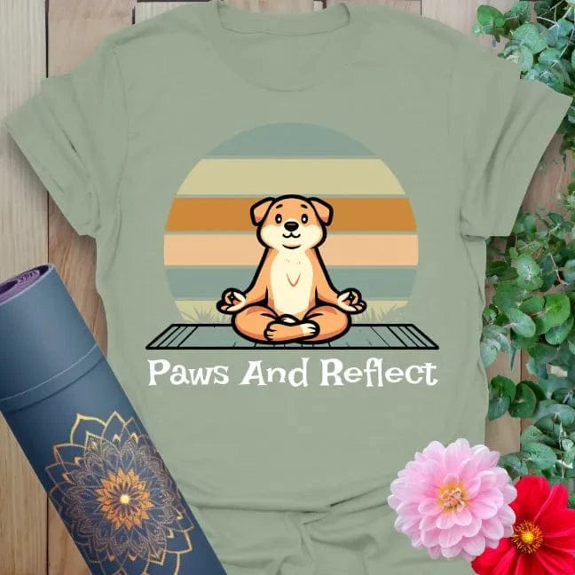 Calm sage green yoga t-shirt featuring peaceful dog meditation scene with sunset backdrop for grounded mindful moments.