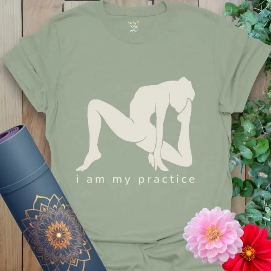 Sage Practice T-Shirt with centered yoga figure and "I am my practice" text. Relaxed fit yoga lifestyle tee.