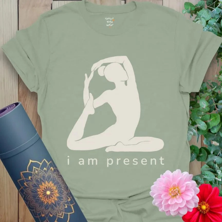Sage Present T-Shirt with yoga pose line art and “i am present” affirmation. Relaxed yoga lifestyle tee.