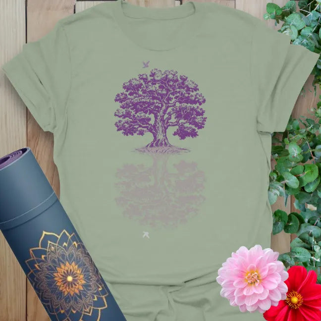 Calm sage green yoga t-shirt featuring tree of life design symbolizing inner and outer harmony, grounding, and mindful living.