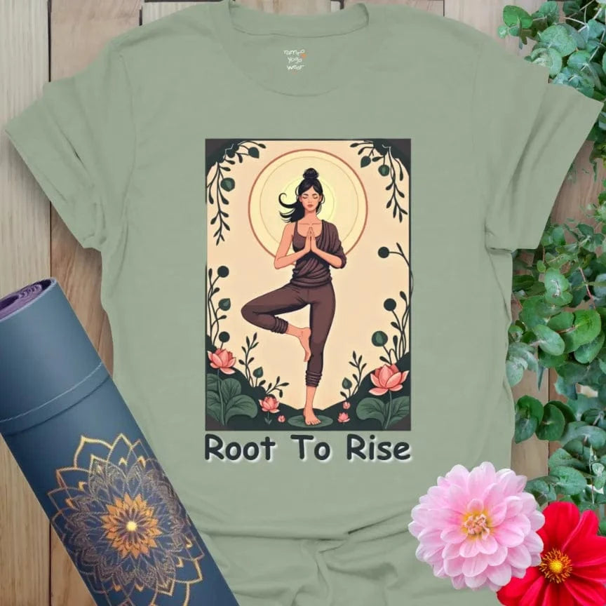 Sage green yoga t-shirt with meditative Tree Pose figure and “Root to Rise” message for grounded, mindful living.