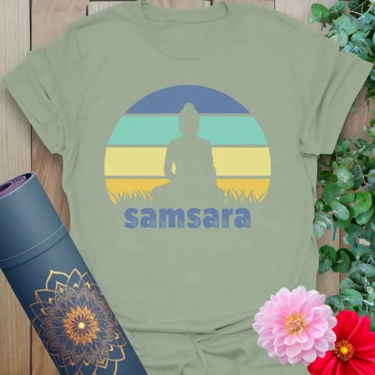 Calm sage green yoga t-shirt featuring meditative silhouette and "samsara" message inspiring soulful, cyclical living and conscious evolution.
