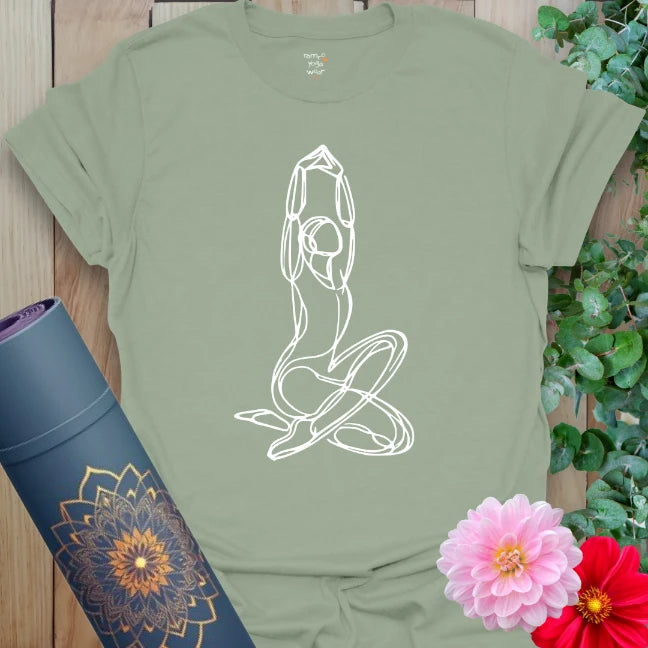 Calm sage green yoga t-shirt featuring flowing seated goddess design for heart-centered living, soulful movement, and mindful grace.