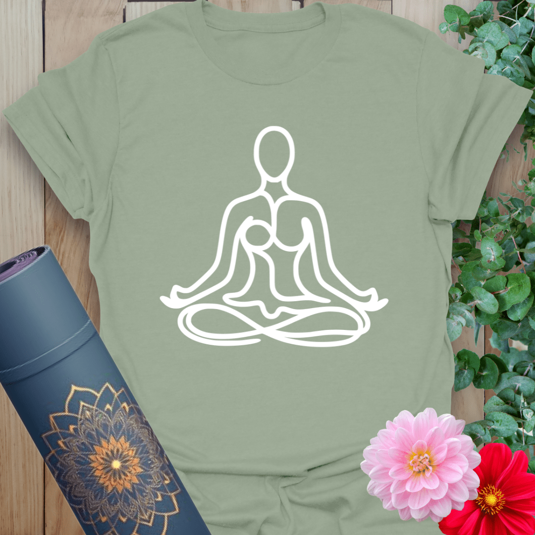 Sage green yoga tee with minimalist duo in seated pose for calm, connection, and soulful stillness.
