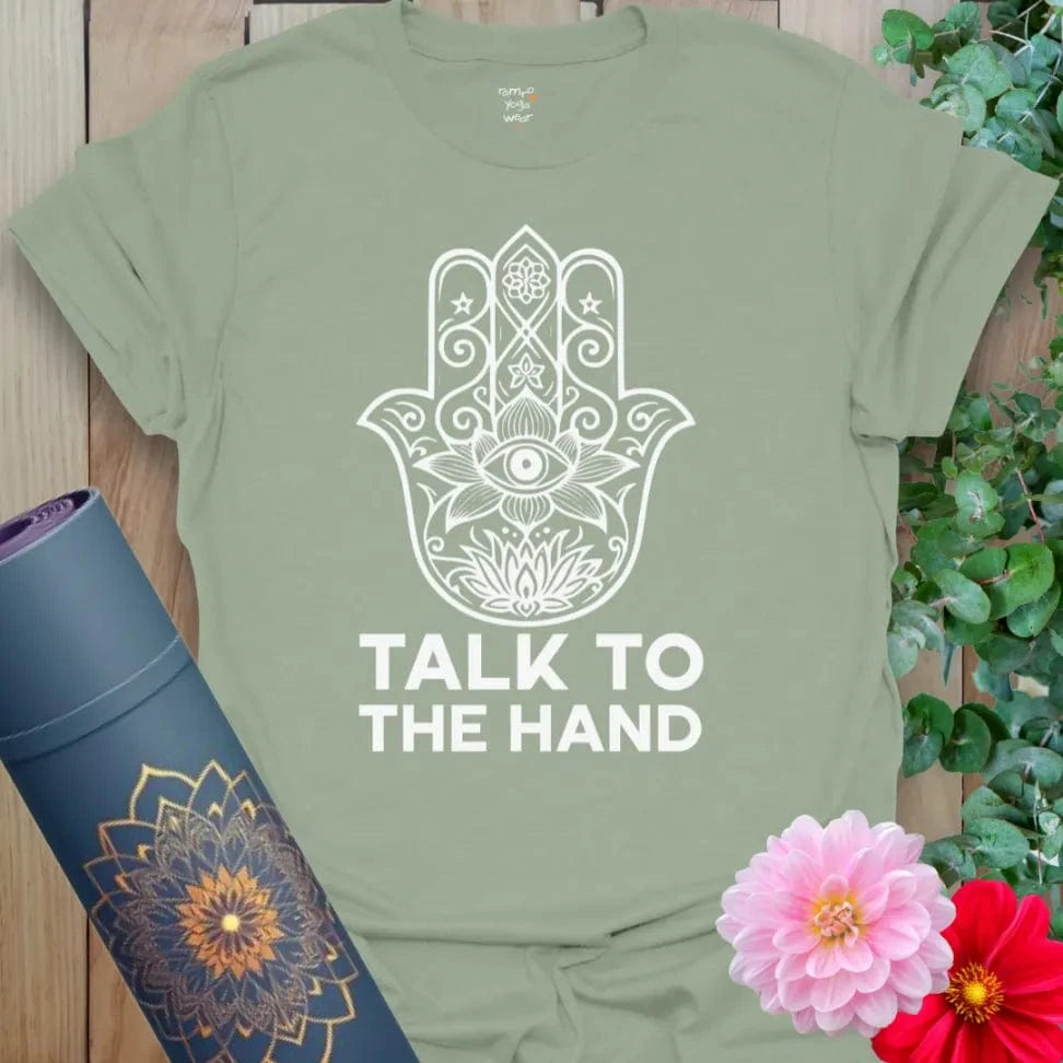 Sage green yoga t-shirt featuring intricate Hamsa art and “Talk to the Hand” design, ideal for energy protection and sass.